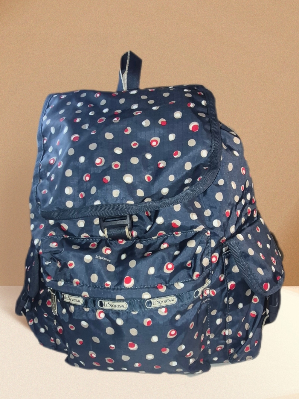 Lesportsac Navy Backpack with White and Red Dot Print